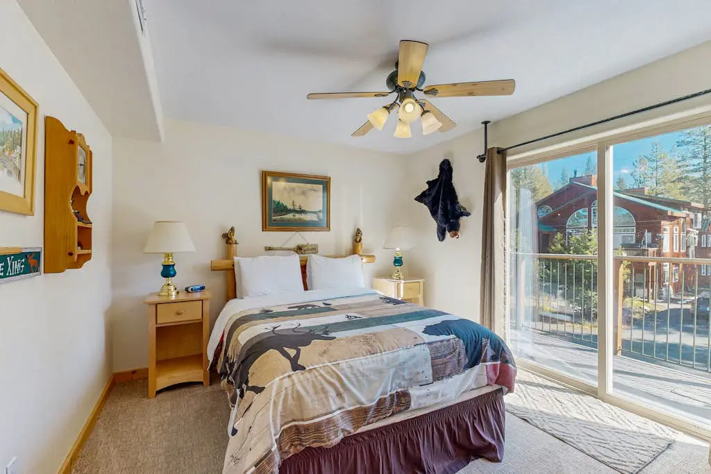 Family-friendly, lakefront getaway with a gas fireplace, furnished deck, & views