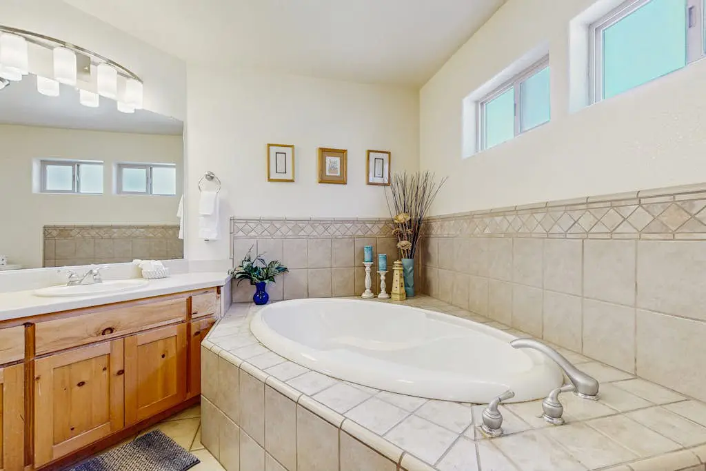 Family-friendly, lakefront getaway with a gas fireplace, furnished deck, & views