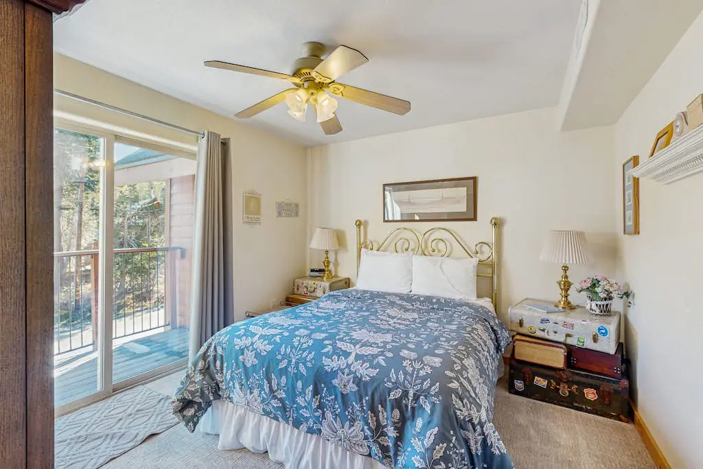 Family-friendly, lakefront getaway with a gas fireplace, furnished deck, & views