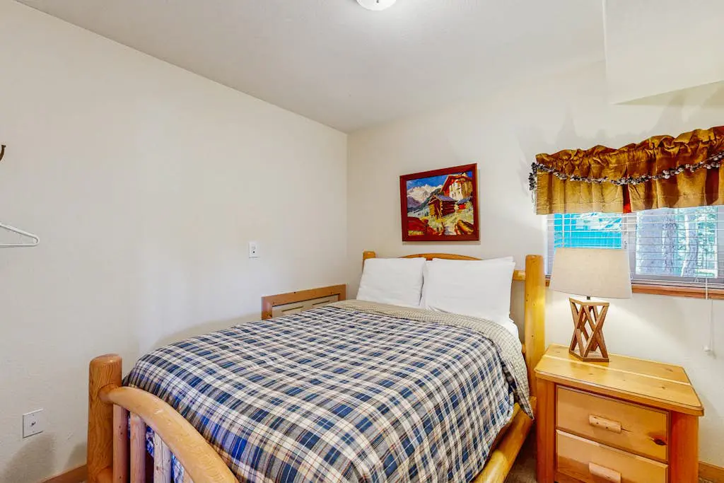 Family-friendly, lakefront getaway with a gas fireplace, furnished deck, & views