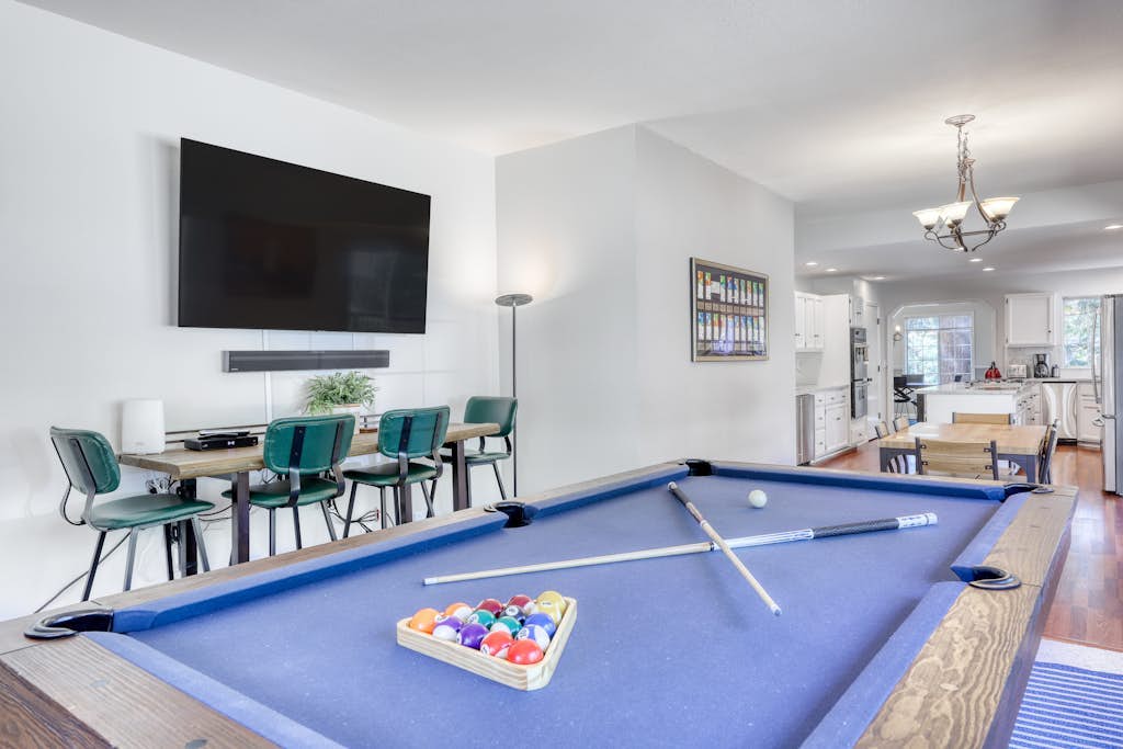 Dog-friendly home with pool table, fireplaces, & private hot tub, sleeps 10