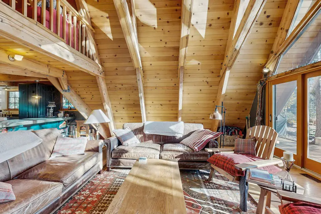 Luxury lakefront home with private hot tub, on-site dock, fireplace & HOA beach