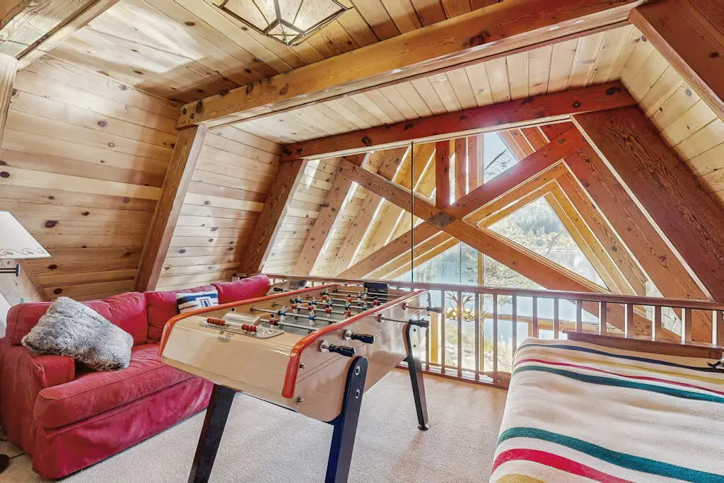 Luxury lakefront home with private hot tub, on-site dock, fireplace & HOA beach