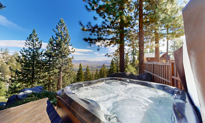 Dog-friendly mountain retreat with private hot tub, fireplace & views, sleeps 8