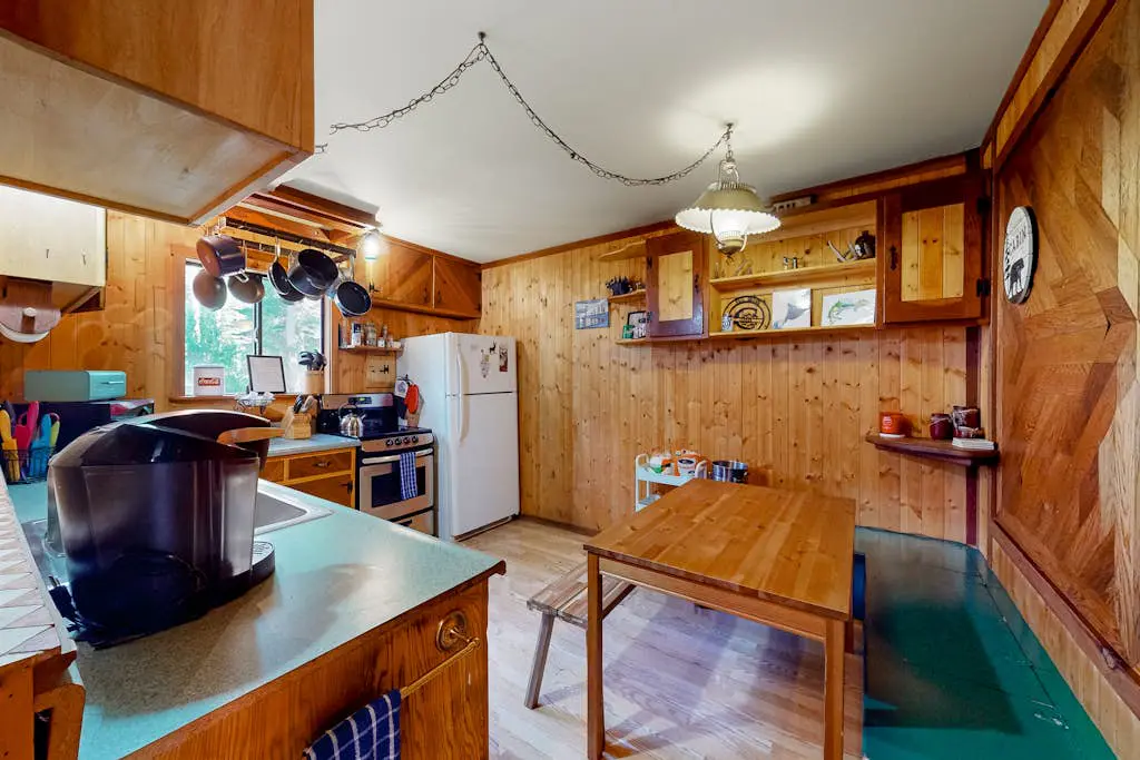 Riverfront dog-friendly retreat with a rustic flair & wood stove, near skiing