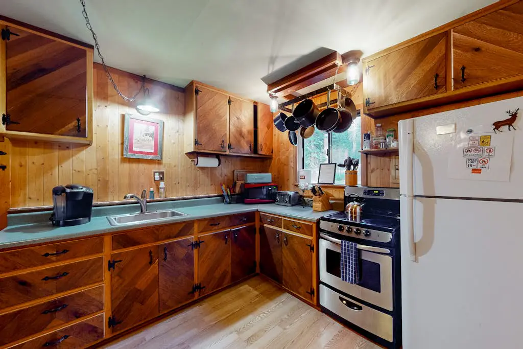 Riverfront dog-friendly retreat with a rustic flair & wood stove, near skiing