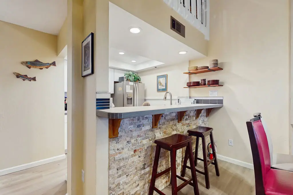 Updated Condo with Lake Views, Heated Floors, Soaking Tub, Pool & Spa Access