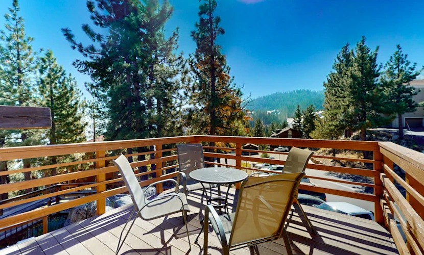 Dog-friendly nature escape with generous balcony, fireplace, & views, sleeps 6
