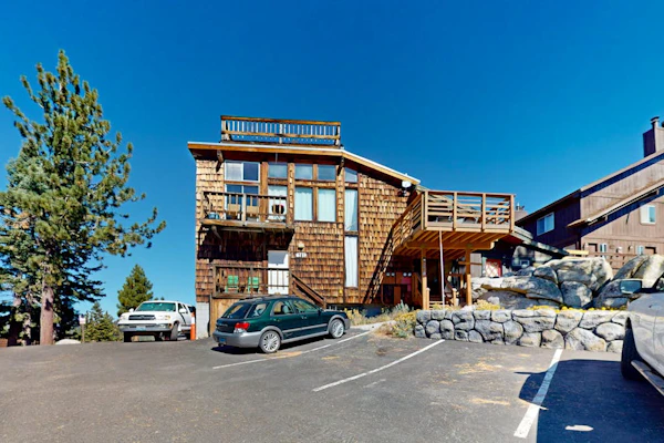 Dog-friendly nature escape with generous balcony, fireplace, & views, sleeps 6