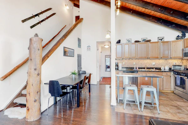 Two-story condo near lifts with fireplace, mountain views, & W/D, sleeps 6