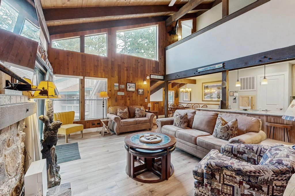 Your next vacation getaway is less than 200 steps to a private beach on the lake