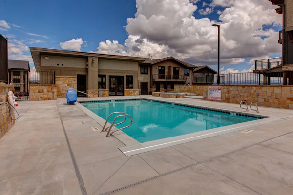 Luxury condo with large deck, pool/hot tub, walk to ski access