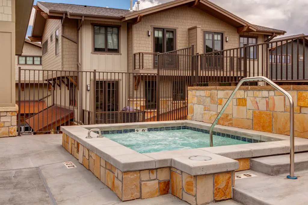 Luxury condo with large deck, pool/hot tub, walk to ski access
