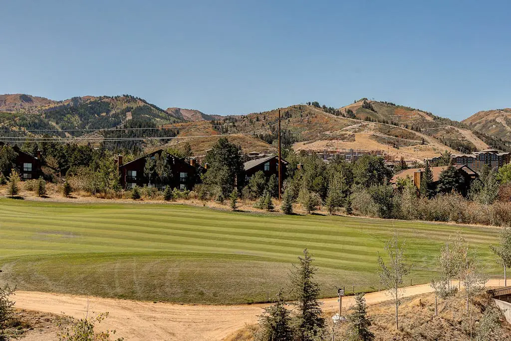 Luxury condo with large deck, pool/hot tub, walk to ski access