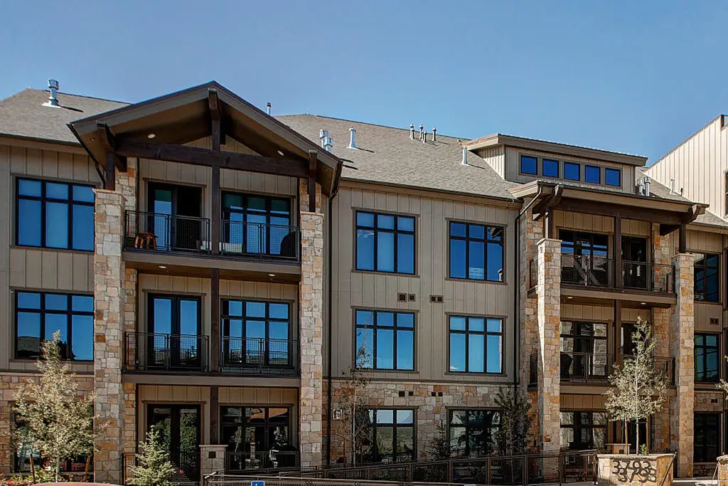 Luxury condo with large deck, pool/hot tub, walk to ski access