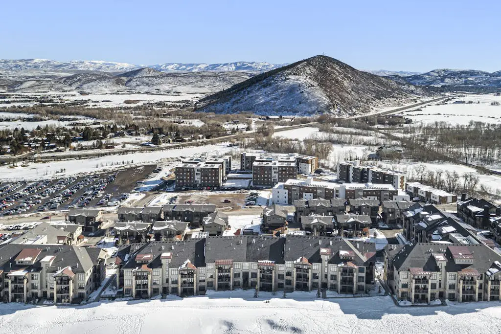 Luxury condo with large deck, pool/hot tub, walk to ski access