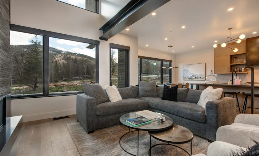 Updated home with a private hot tub, fireplace, & mountain views - dog friendly