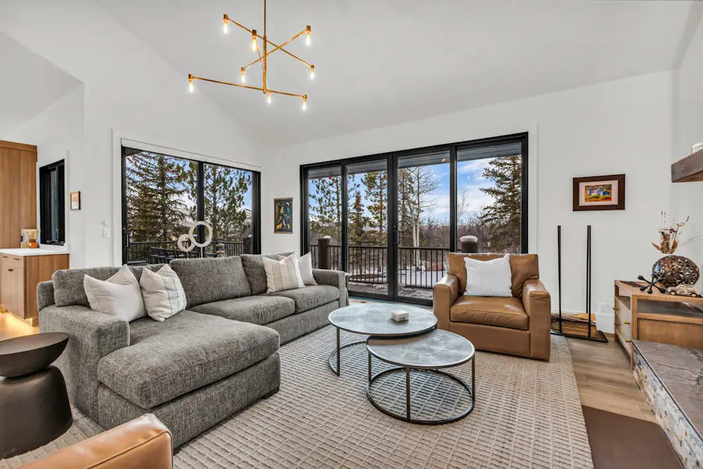 Mountain-view abode with a hot tub, scenic balcony, fireplaces, & free shuttle