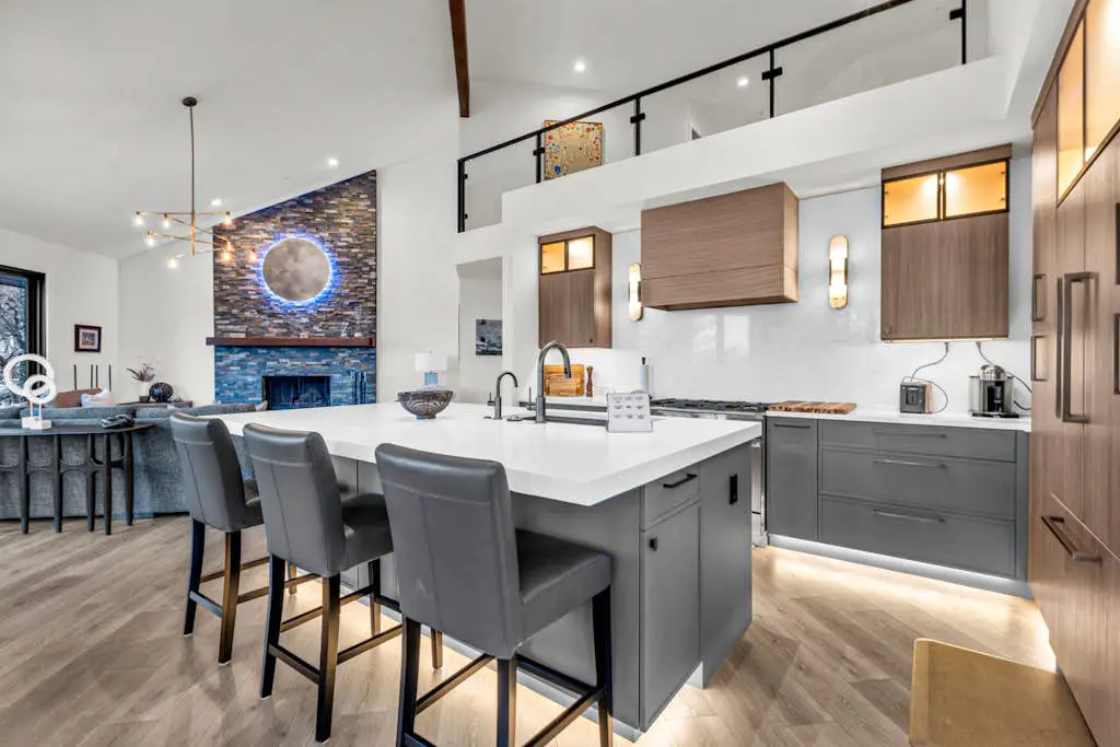 Mountain-view abode with a hot tub, scenic balcony, fireplaces, & free shuttle