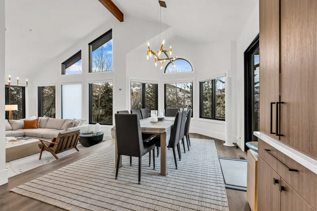 Mountain-view abode with a hot tub, scenic balcony, fireplaces, & free shuttle