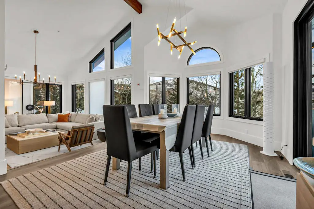 Mountain-view abode with a hot tub, scenic balcony, fireplaces, & free shuttle