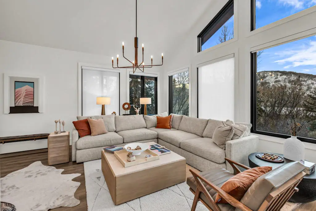 Mountain-view abode with a hot tub, scenic balcony, fireplaces, & free shuttle