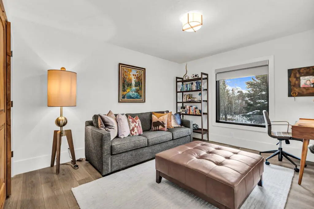 Mountain-view abode with a hot tub, scenic balcony, fireplaces, & free shuttle