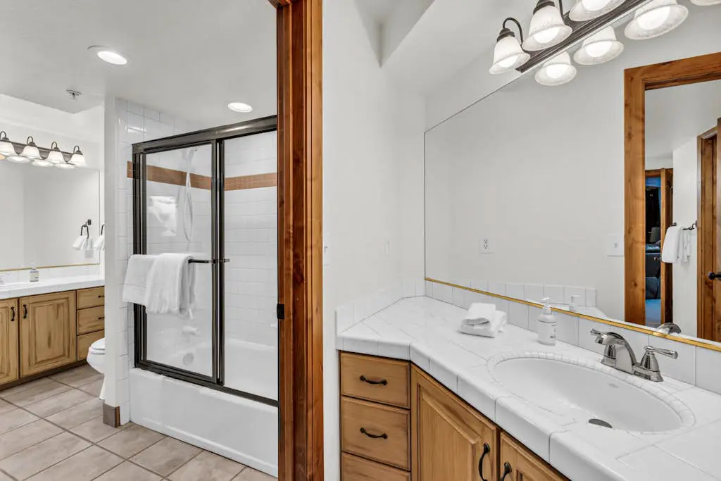 Mountain-view abode with a hot tub, scenic balcony, fireplaces, & free shuttle