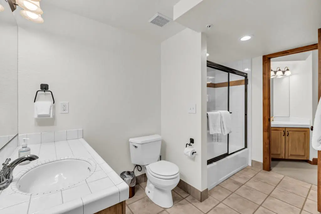 Mountain-view abode with a hot tub, scenic balcony, fireplaces, & free shuttle
