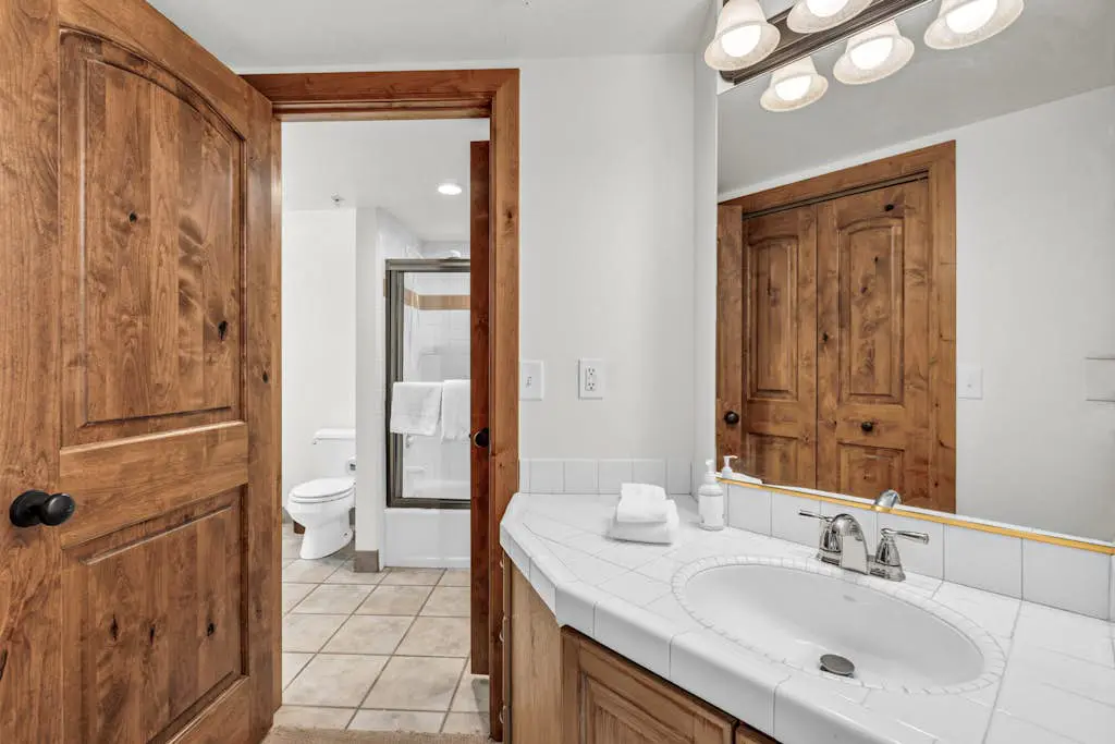 Mountain-view abode with a hot tub, scenic balcony, fireplaces, & free shuttle