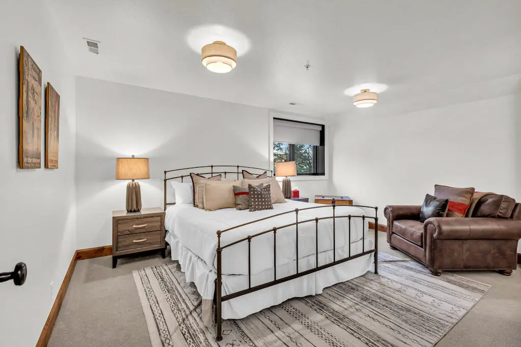 Mountain-view abode with a hot tub, scenic balcony, fireplaces, & free shuttle