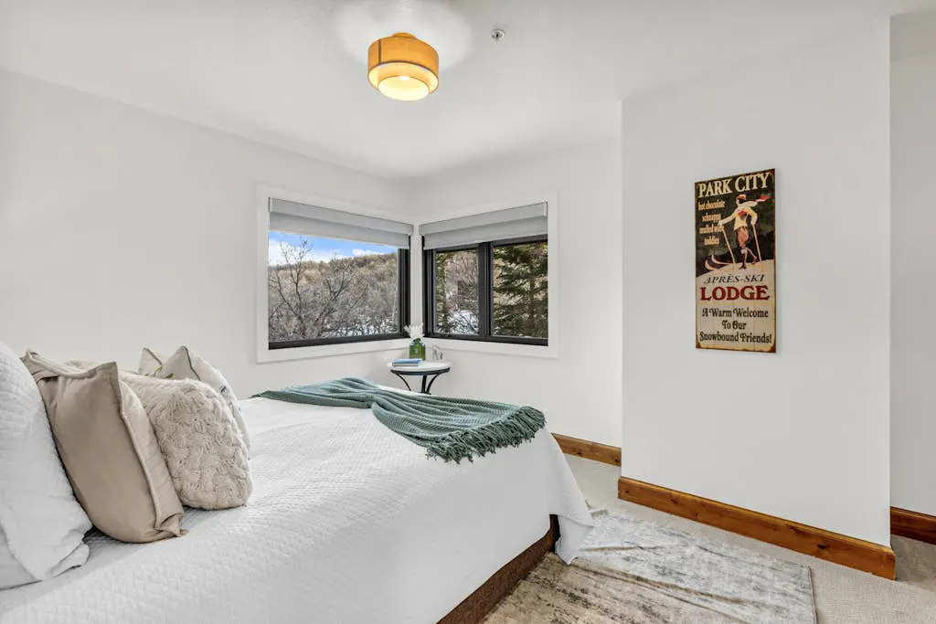 Mountain-view abode with a hot tub, scenic balcony, fireplaces, & free shuttle