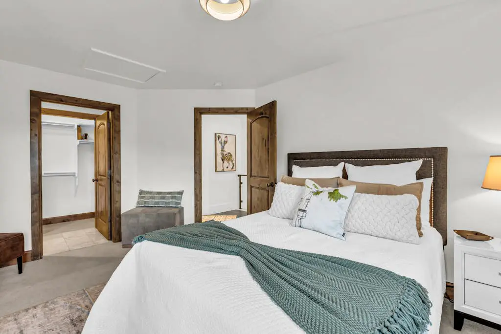 Mountain-view abode with a hot tub, scenic balcony, fireplaces, & free shuttle