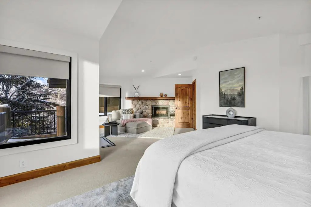 Mountain-view abode with a hot tub, scenic balcony, fireplaces, & free shuttle