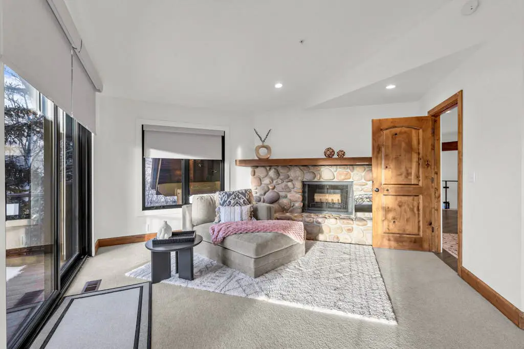 Mountain-view abode with a hot tub, scenic balcony, fireplaces, & free shuttle