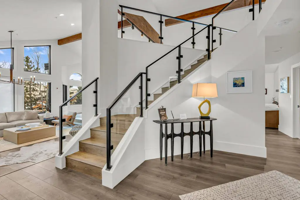 Mountain-view abode with a hot tub, scenic balcony, fireplaces, & free shuttle