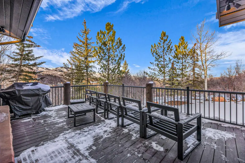 Mountain-view abode with a hot tub, scenic balcony, fireplaces, & free shuttle