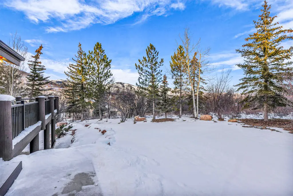 Mountain-view abode with a hot tub, scenic balcony, fireplaces, & free shuttle