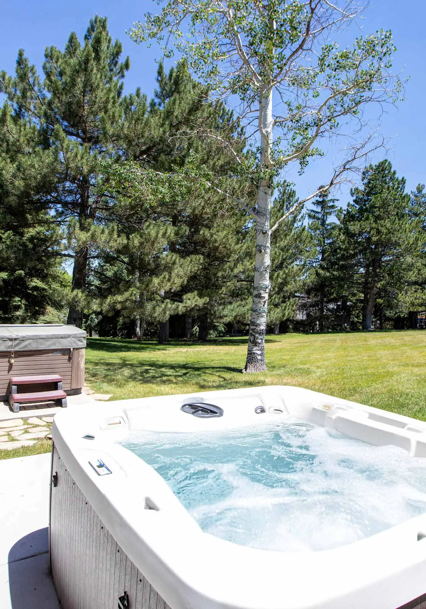 Dog-friendly townhome with hot tub, tennis, & private balcony