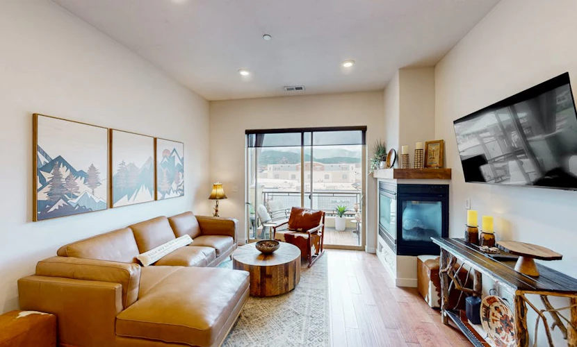 Inviting condo in Newpark Town Center with hot tub and great balcony views