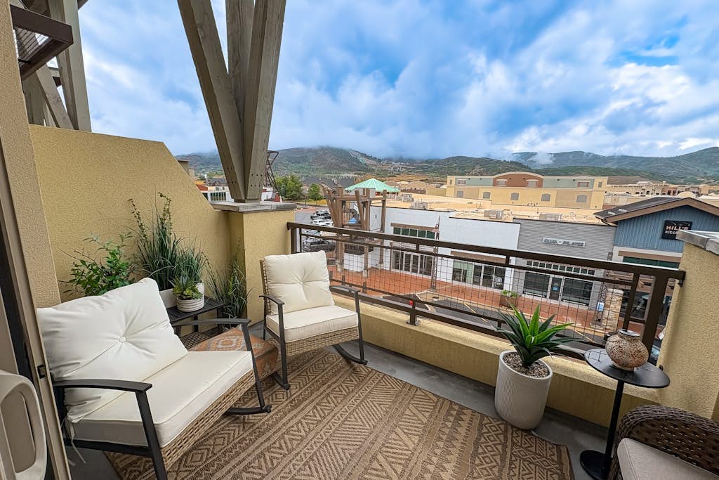 Inviting condo in Newpark Town Center with hot tub and great balcony views