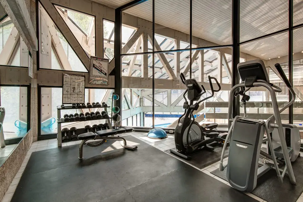 Ski-in/out condo with WiFi, private hot tub, fireplace, shared pool, & gym