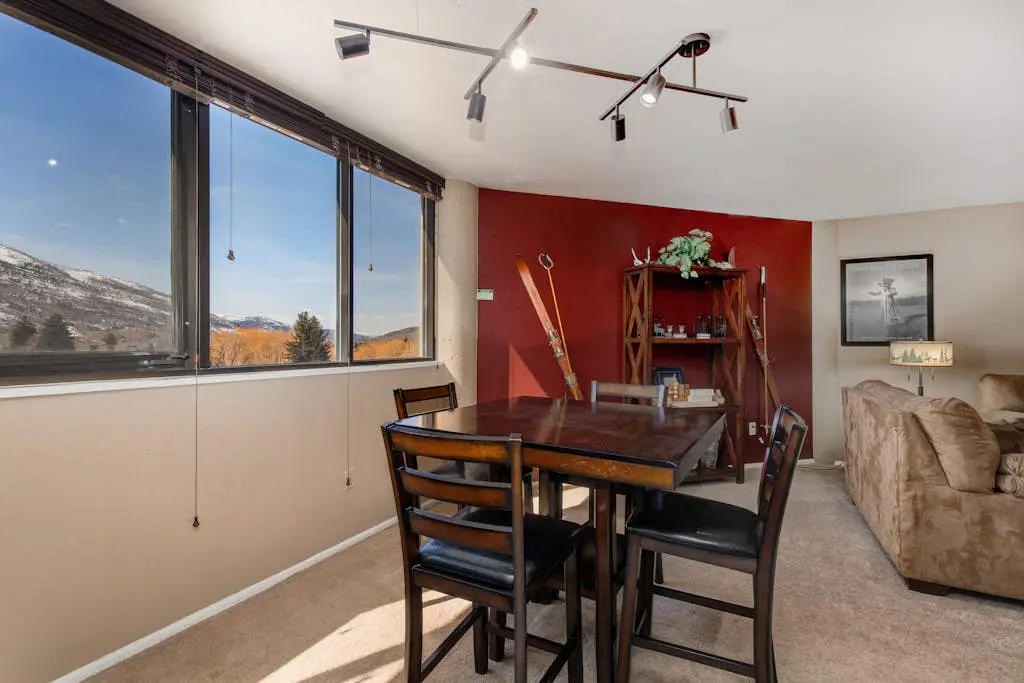Ski-in/out condo with WiFi, private hot tub, fireplace, shared pool, & gym