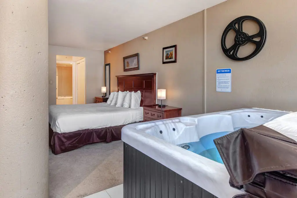 Ski-in/out condo with WiFi, private hot tub, fireplace, shared pool, & gym