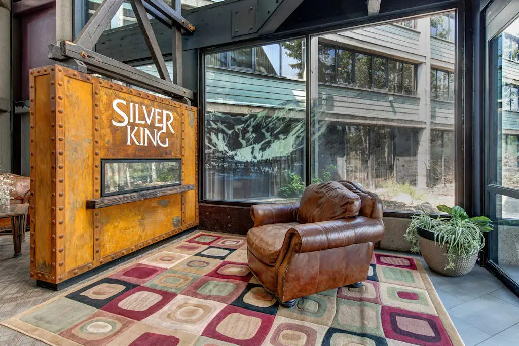 Ski-in/out condo with WiFi, private hot tub, fireplace, shared pool, & gym