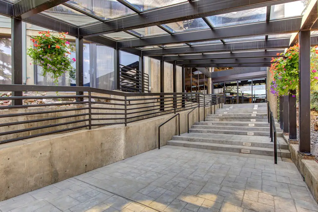Ski-in/out condo with WiFi, private hot tub, fireplace, shared pool, & gym