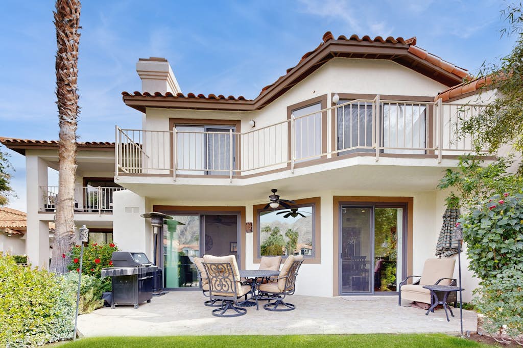 Relax in this 2BR/2.5BA home in La Quinta overlooking a peaceful pond near PGA West Golf Course.