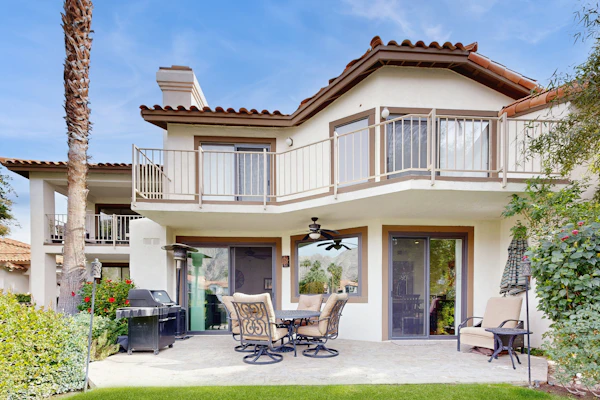 Relax in this 2BR/2.5BA home in La Quinta overlooking a peaceful pond near PGA West Golf Course.