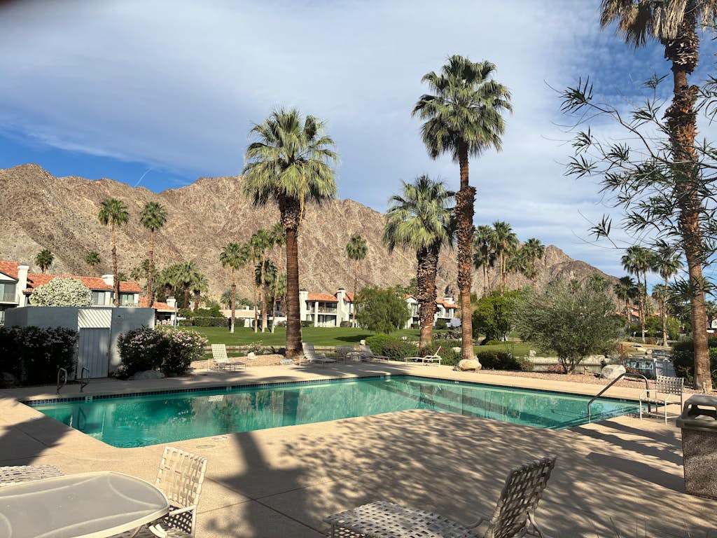 Relax in this 2BR/2.5BA home in La Quinta overlooking a peaceful pond near PGA West Golf Course.
