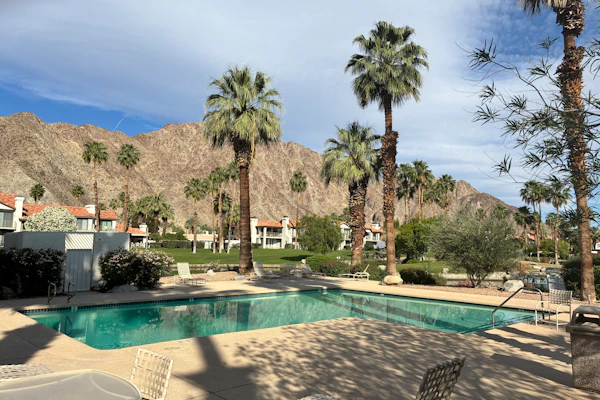 Relax in this 2BR/2.5BA home in La Quinta overlooking a peaceful pond near PGA West Golf Course.